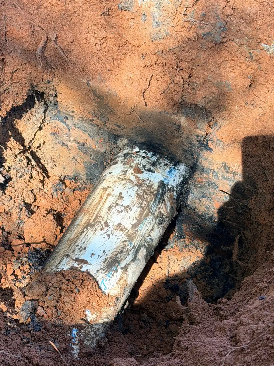 Broken pipe uncovered in the yard during a repair call in Ellenboro, NC